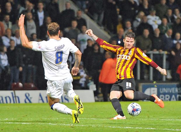 Bradford Telegraph and Argus: Billy Knott thumps home the equaliser against Leeds. Picture: Tom Smith.